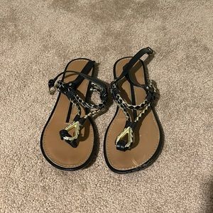 New directions Black and gold sandals. They are 9